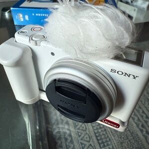 Sony White Digital Camera with Lens Cap